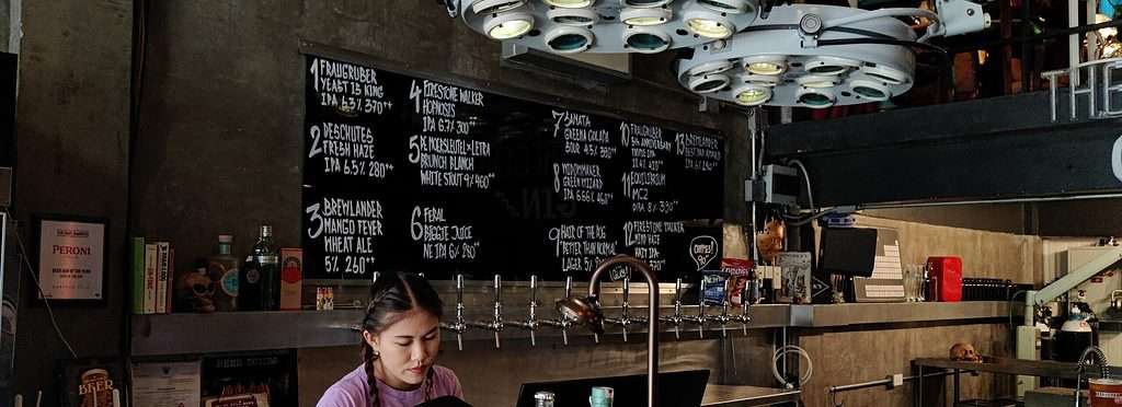 Hair of the Dog craft beer bar tap wall in Bangkok Thailand