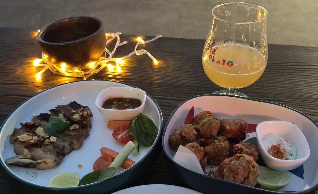 food on a wooden table at 12°Plato Brewing Bangkok Thailand