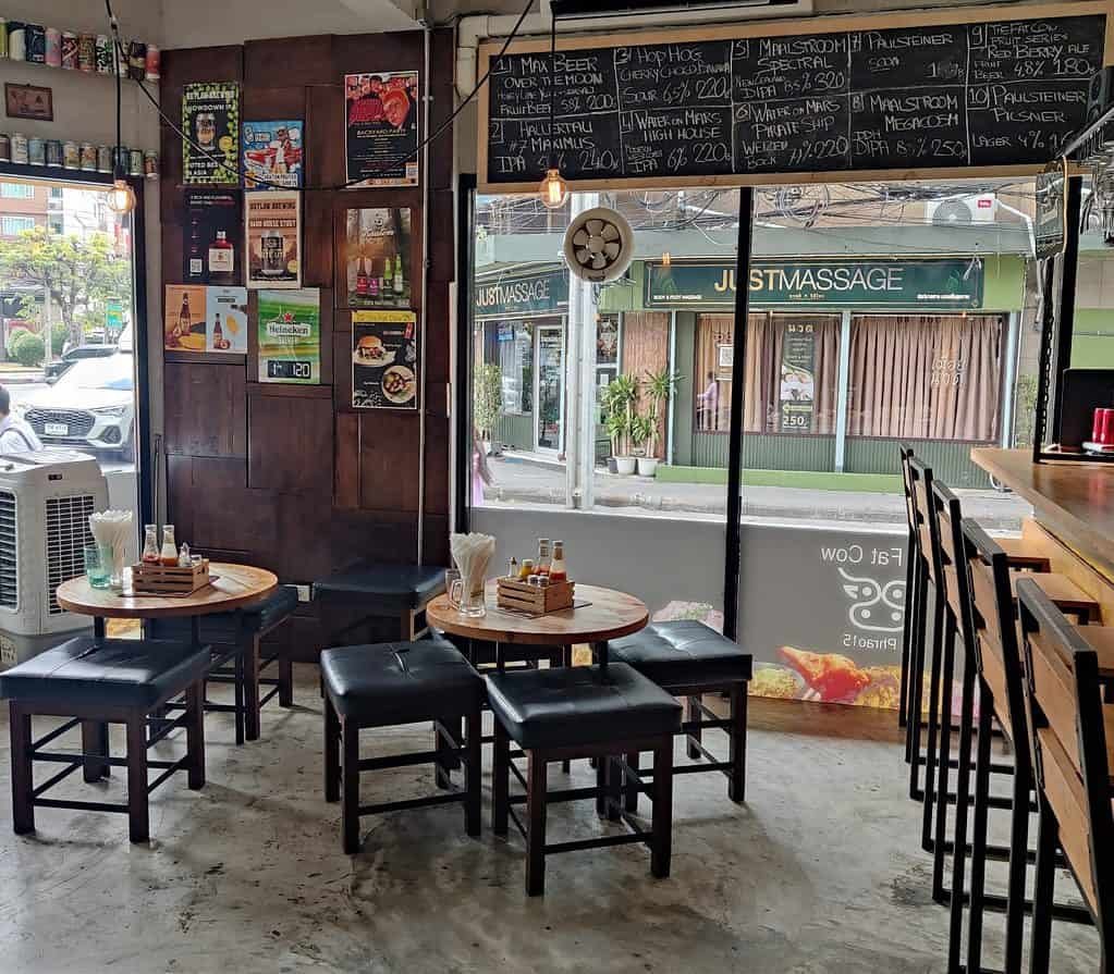 Seating and craft beer signage at the Fat Cow in Bangkok