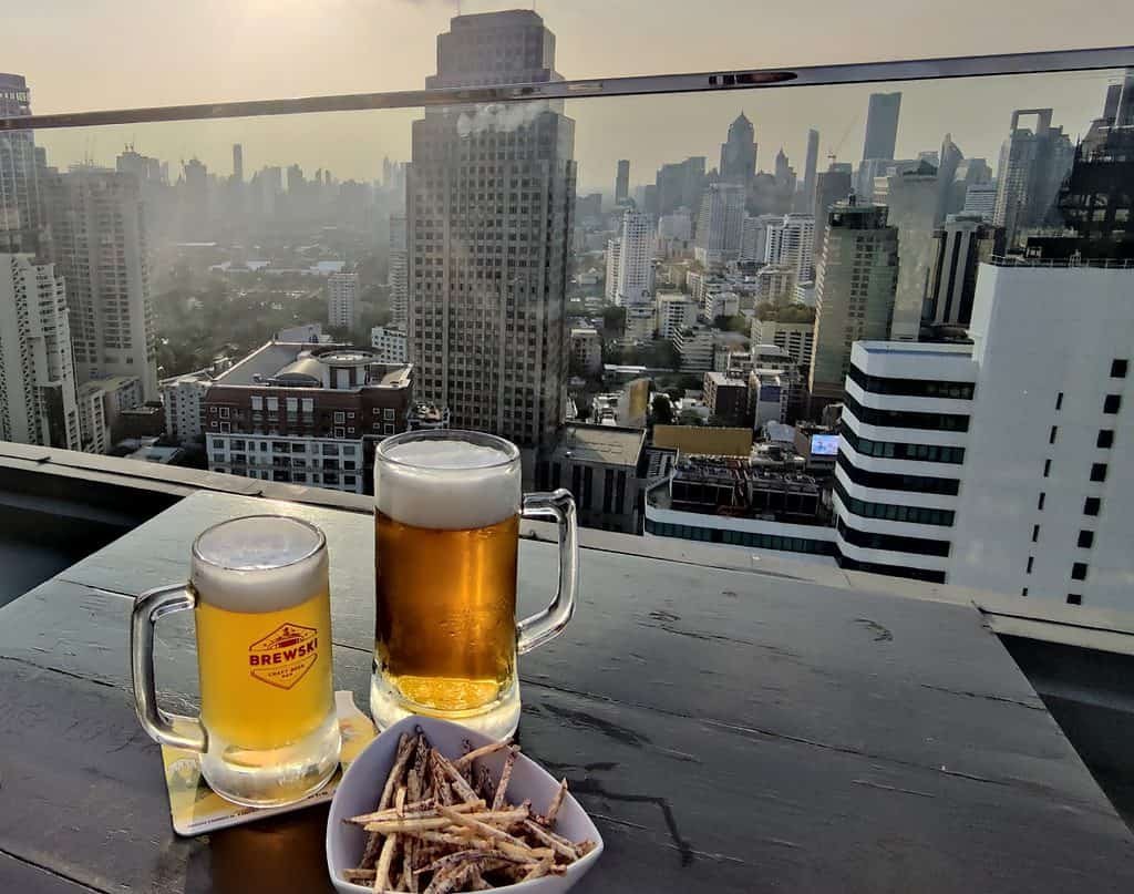 Two pints of beer outside at Brewski craft beer bar in Bangkok Thailand