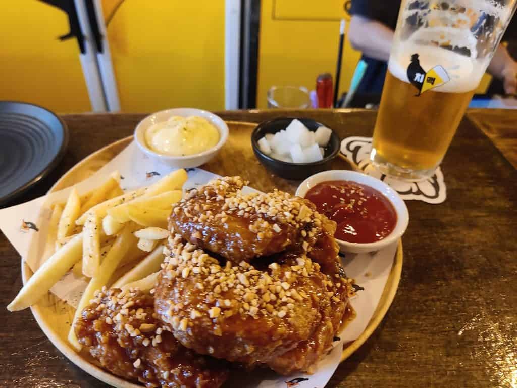 Plate of spicy fried chicken served at Changwon Express in Bangkok Thailand.