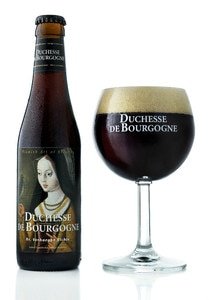 Bottle and glass of Duchess de Bourgogne beer.https://s3.amazonaws.com/beertourprod/beers/pictures/000/000/166/medium/Duchesse_de_Bourgogne_-_900.jpg?1473885418