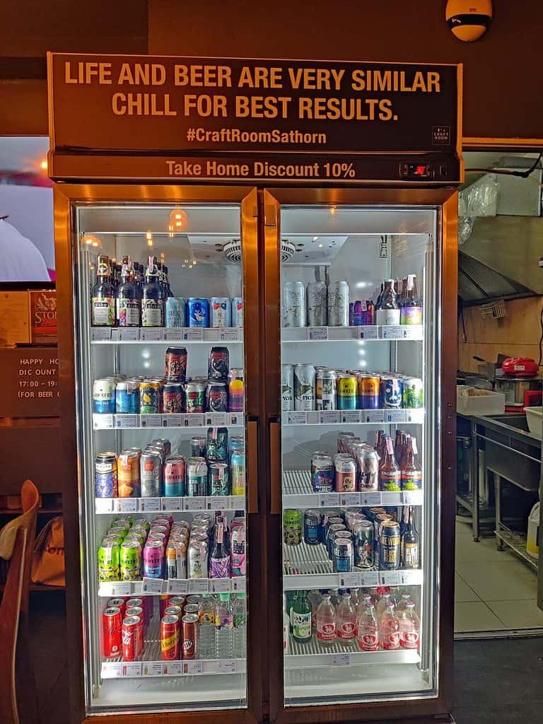 Craft Room Sathorn - craft beer bar in Bangkok Thailand. Beer fridge includes imported and local Thai craft beer. 