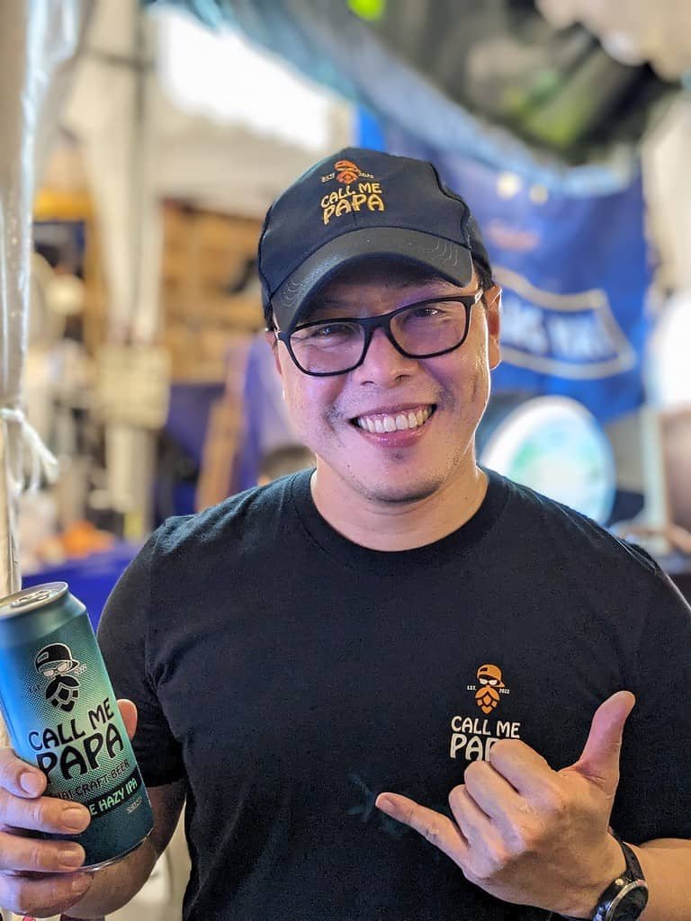 Call Me Papa serving a beer at Beer Market 2 at Chang Chui Creative Park in Bangkok, Thailand.
Organized by ประชาชนเบียร์ (Beer People).