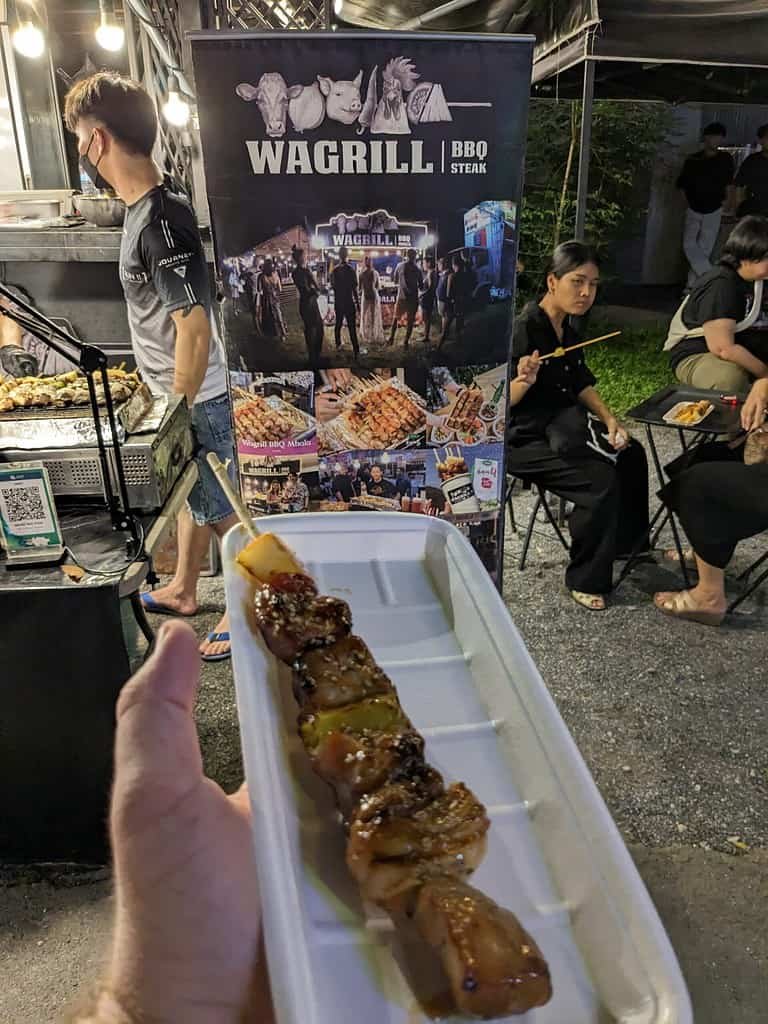 Wagrill serving a kebab at Beer Market 2 at Chang Chui Creative Park in Bangkok, Thailand.
Organized by ประชาชนเบียร์ (Beer People).