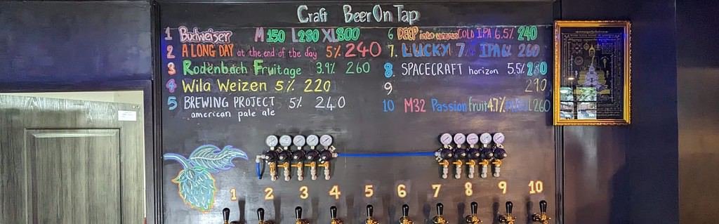 the draft beer board at Yok-Ka-Dok craft beer bar in Bangkok Thailand. Offering a variety of local beers west of the Chao Phraya river.