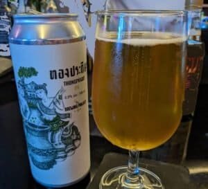 Thong Pradit and the Brewing Project collaboration can of beer and beer in glass 