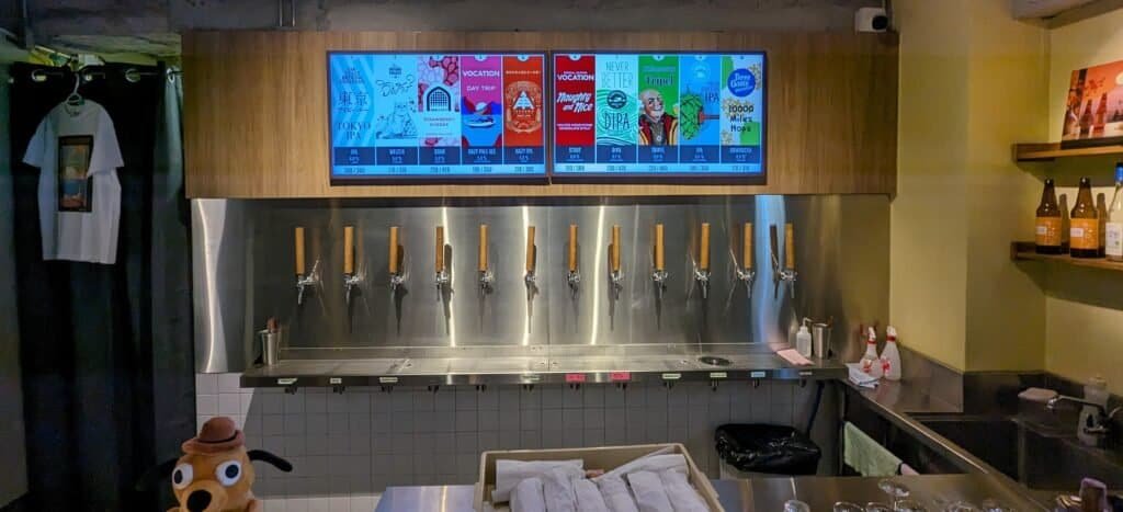 The tap wall at Hazy Hound, craft beer bar in Bangkok Thailand. 