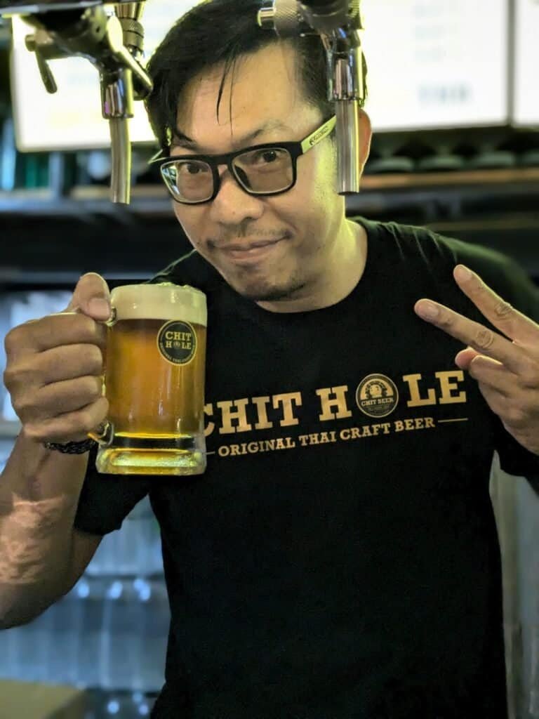 serving a beer at Chit Hole Silom, local craft beer, picture by Bangkok Beer Guide