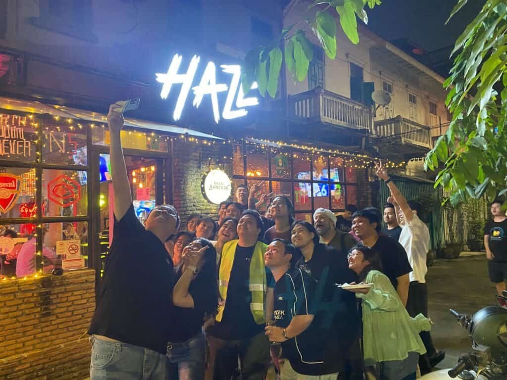 Group of beer lovers outside Haze bar in Bangkok.
