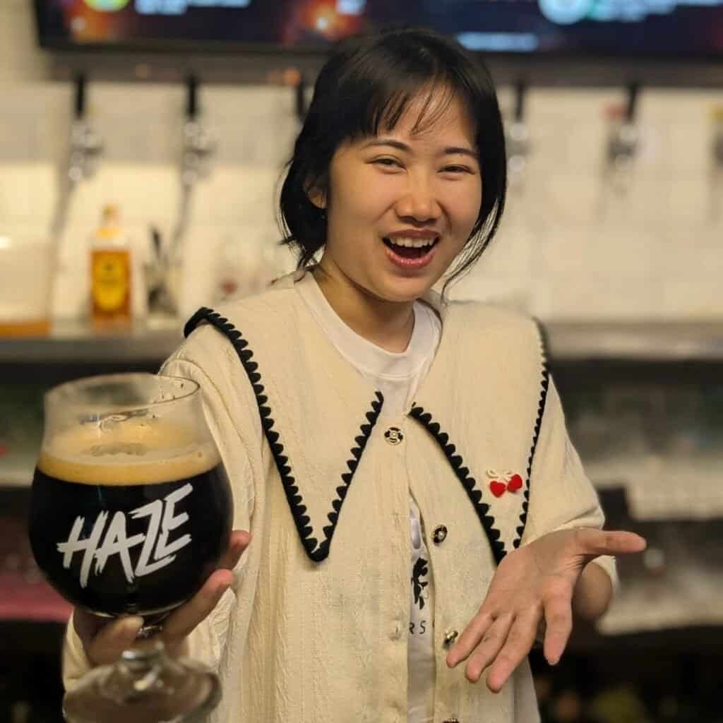 Serving a glass of beer at Haze bar in Bangkok Thailand.