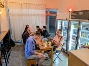 customers at the Duke of Beerington in Bangkok Thailand, craft beer bottle shop