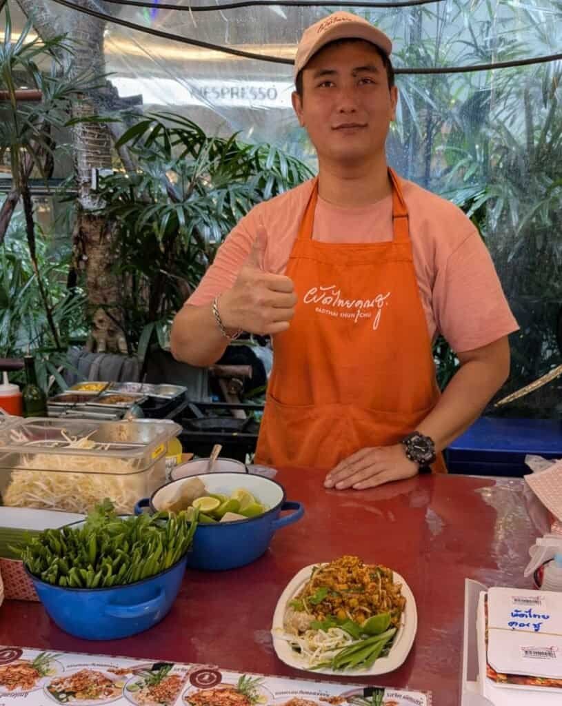 Serving the Pad Thai at Kud-Thai at EmQuartier mall in Bangkok Thailand