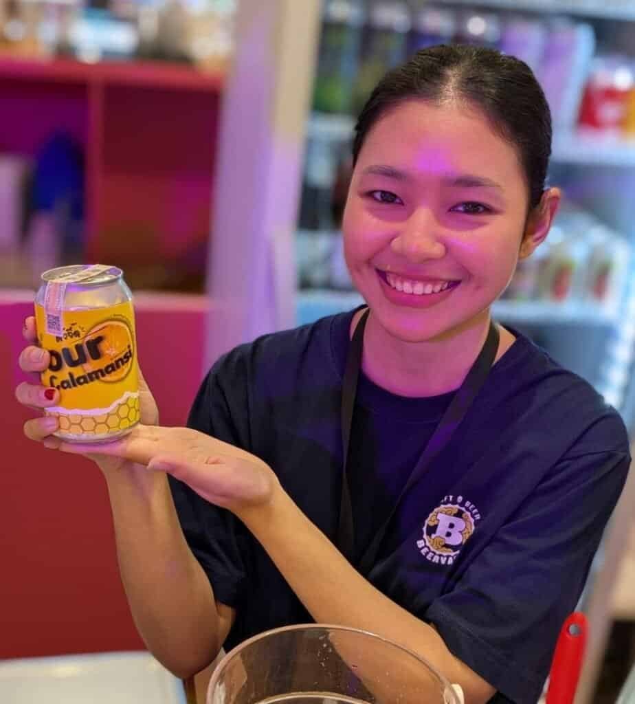 Serving a Sour Grayscale Mead at Kud-Thai at EmSphere mall in Bangkok Thailand