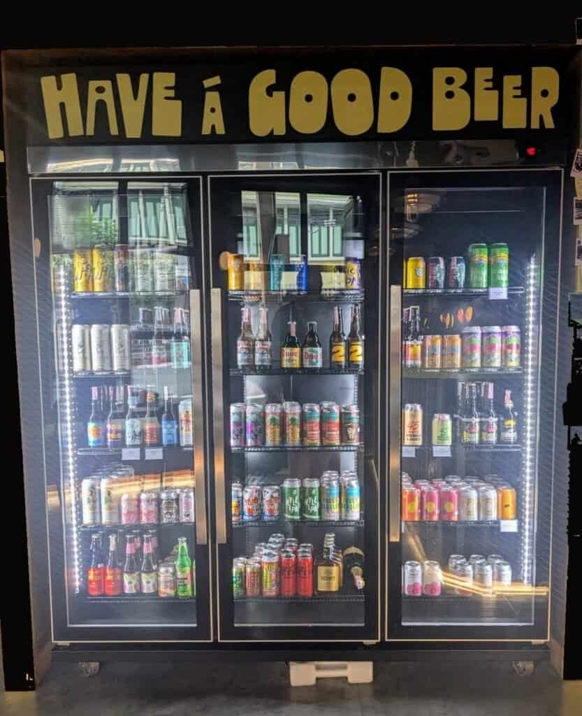 beer fridge at Yellow Cloud beer and bottle shop in Bangkok Thailand