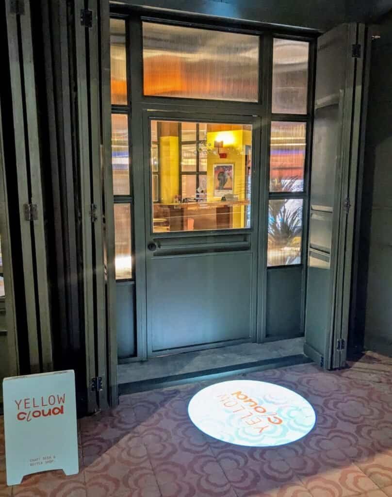 Entrance to Yellow Cloud beer and bottle shop in Bangkok Thailand