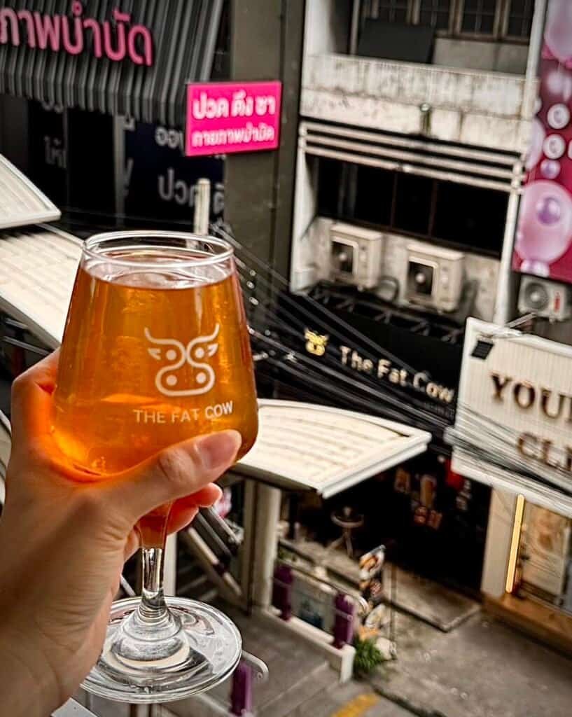 A branded beer glass overlooking the Fat Cow Bang Wa