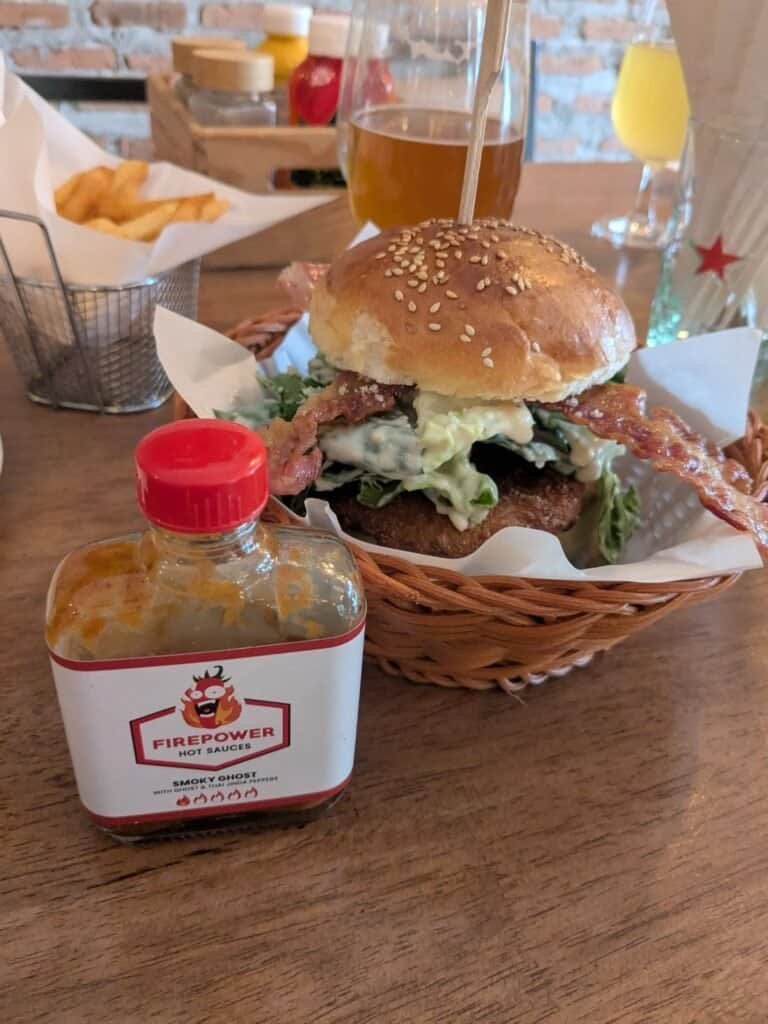 Burger and beer and hot sauceFat Cow Yaowarat